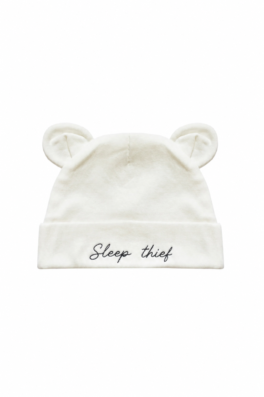 Mamacita Collective Soft Newborn Hat in White worn by a baby.