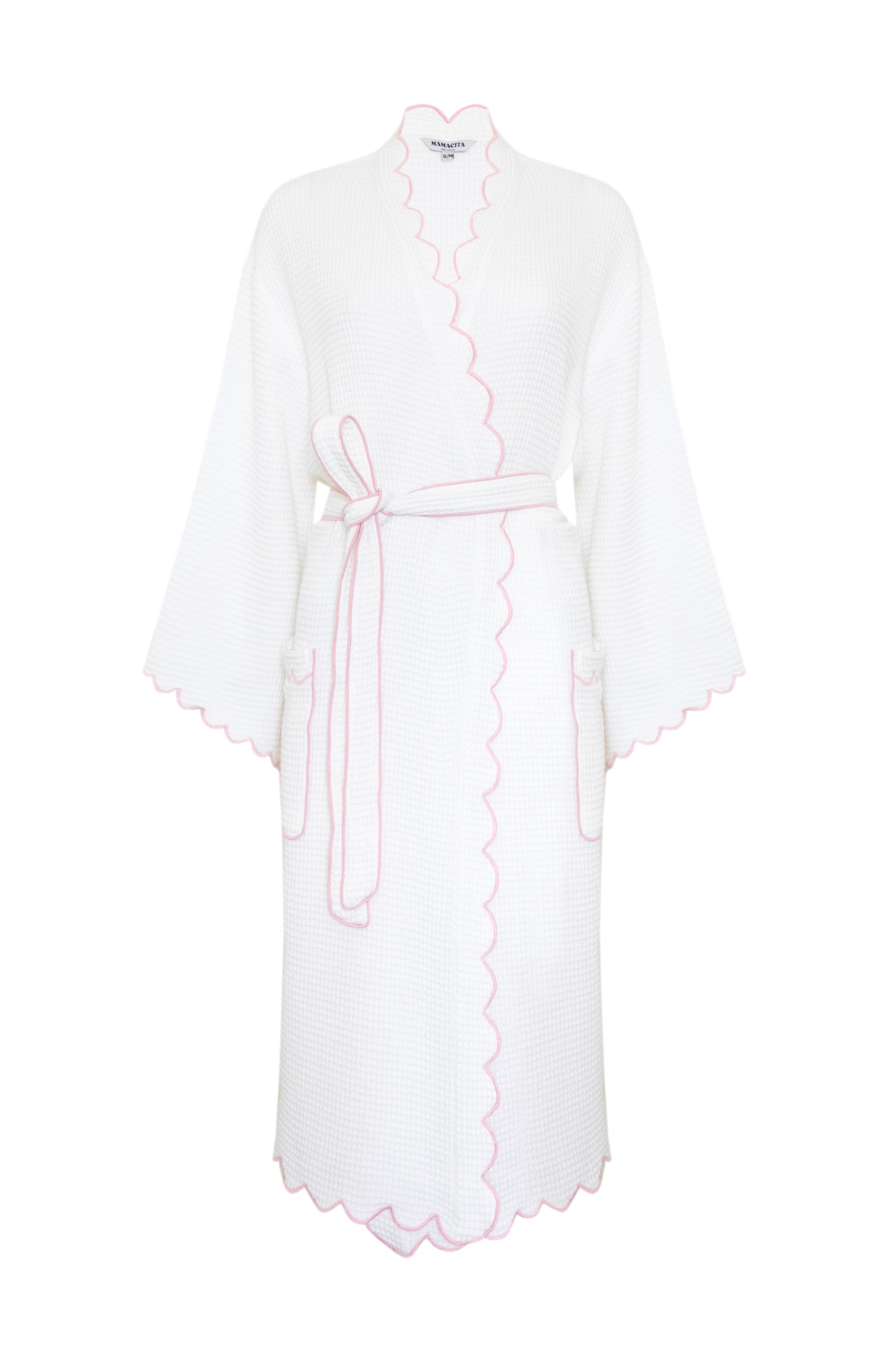 A white scalloped waffle robe with flared 7/8 sleeves and rose pink embroidered edges, tied with a sash at the waist.