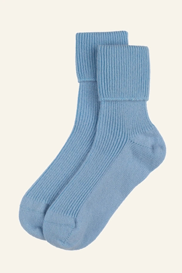 Rosie Sugden Sky Blue cashmere bed socks, shown against a plain background.