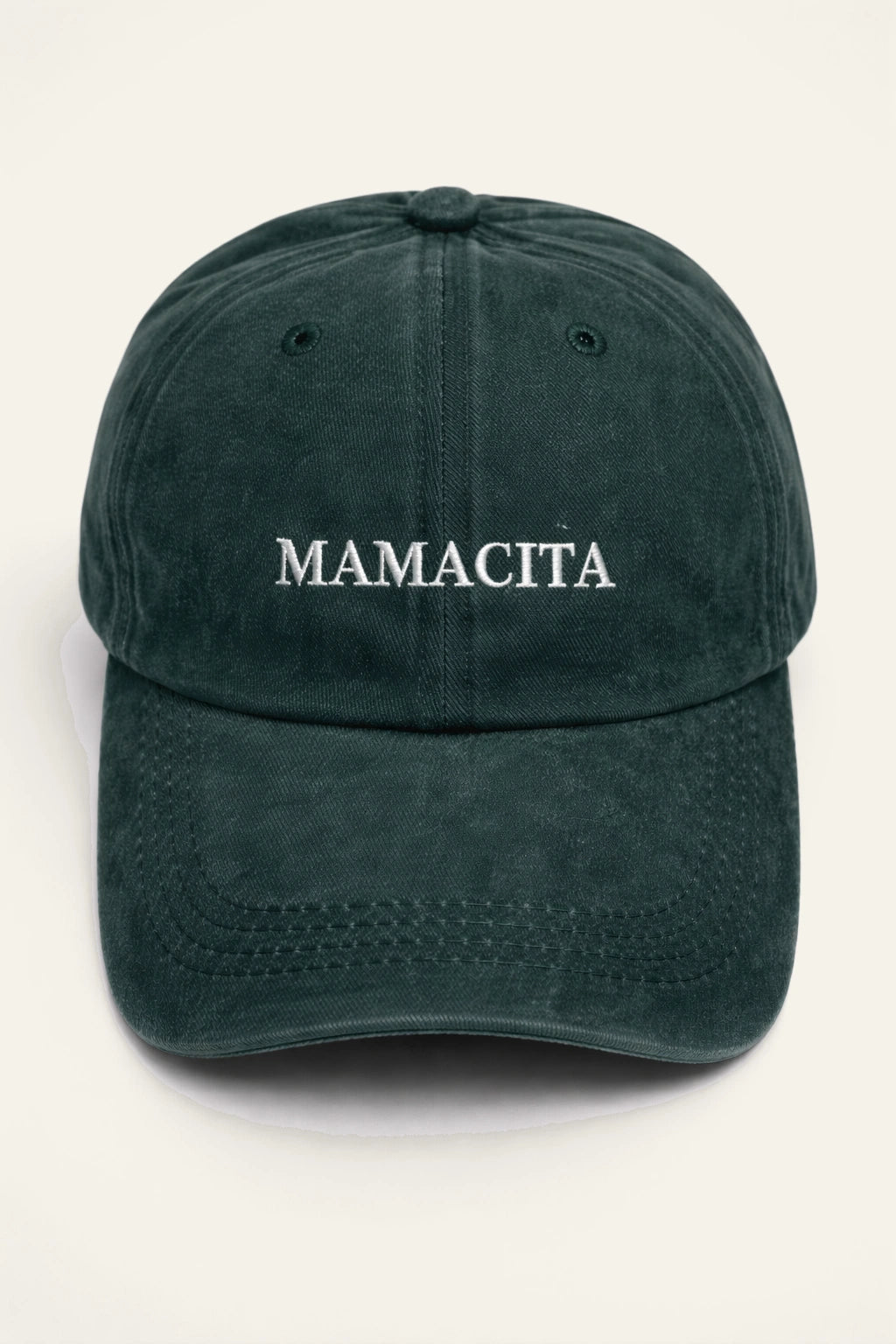Close-up of the Mamacita Cap's embroidered slogan detail.