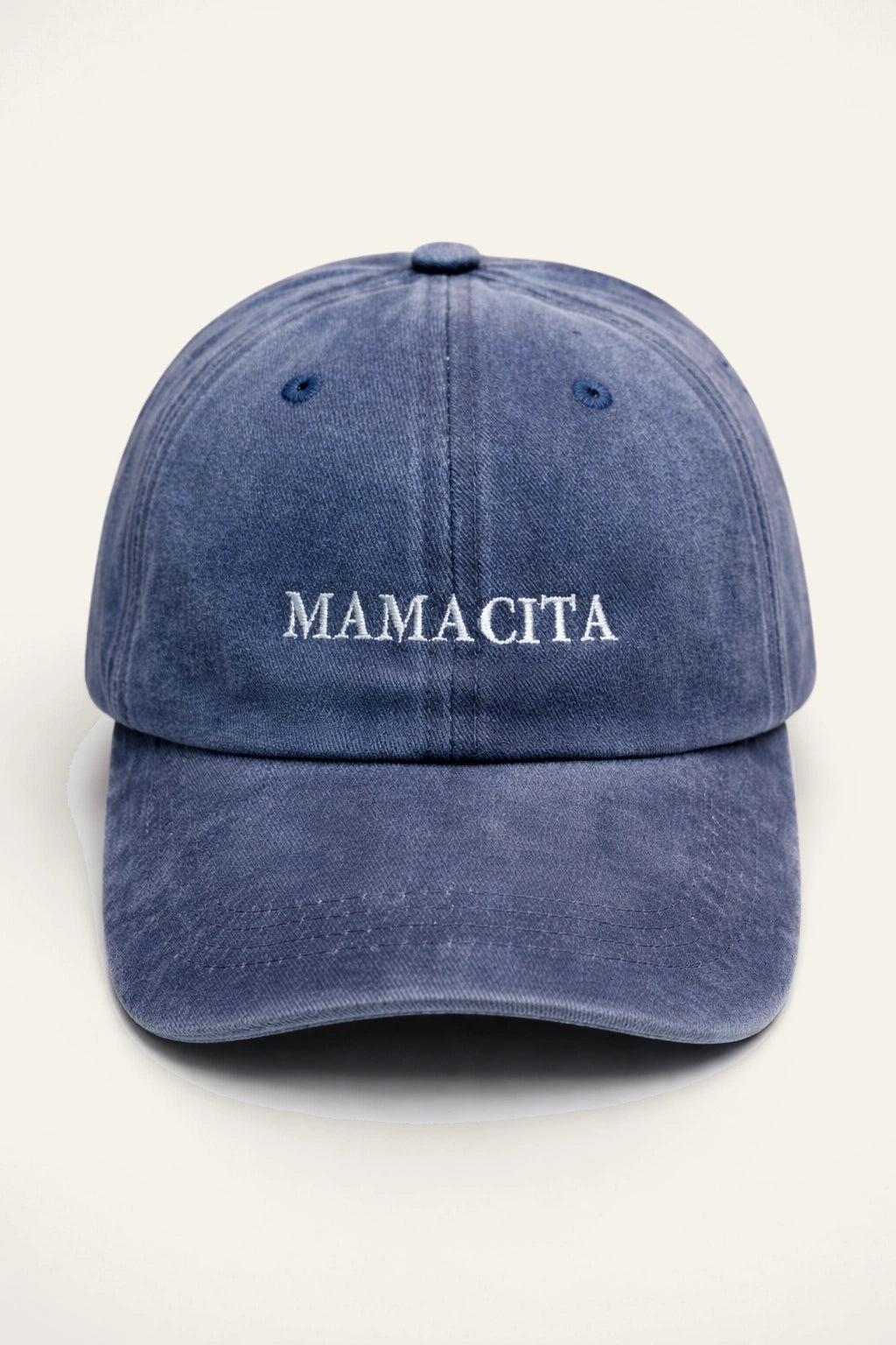 The Mamacita Cap, washed cotton cap with white embroidered 'MAMACITA.' slogan.