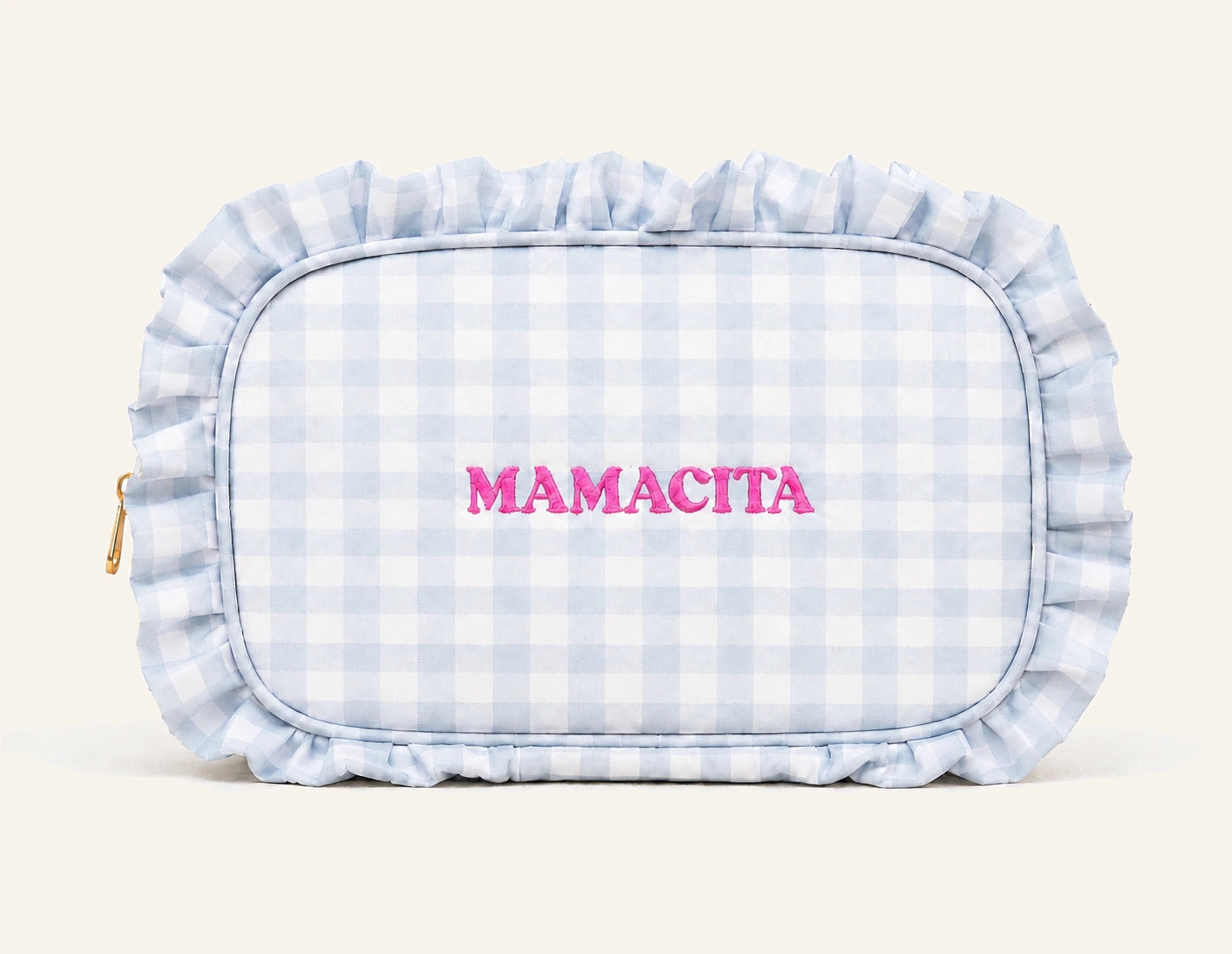 A light blue and white gingham cosmetic pouch with a ruffled fabric trim and the word 'MAMACITA' embroidered in pink across the front, shown on a clean white background.