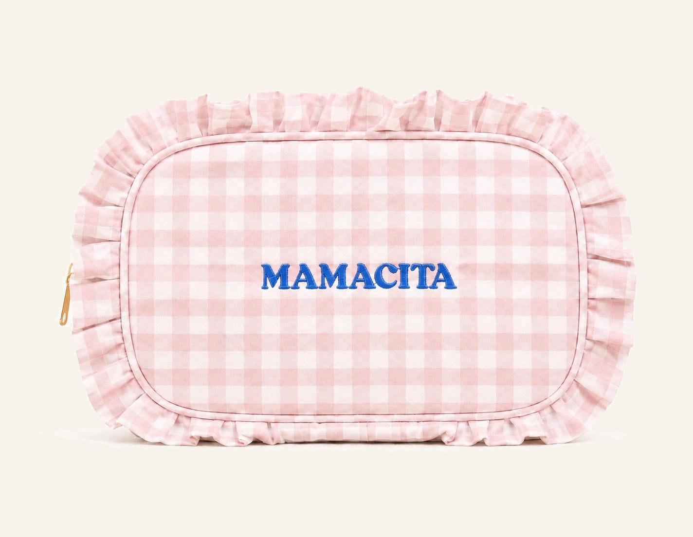 A pink and white gingham cosmetic pouch with a ruffled edge and the brand name 'MAMACITA' embroidered in blue in the center, shown on a plain white background.