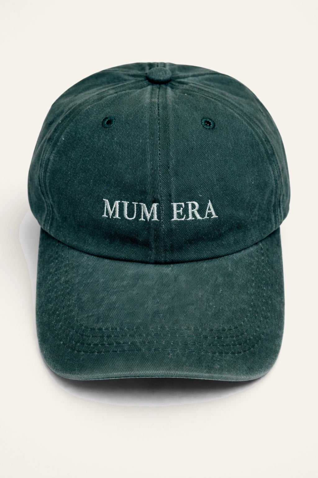 The Mum Era Cap styled on a model, showing the adjustable back fastening.