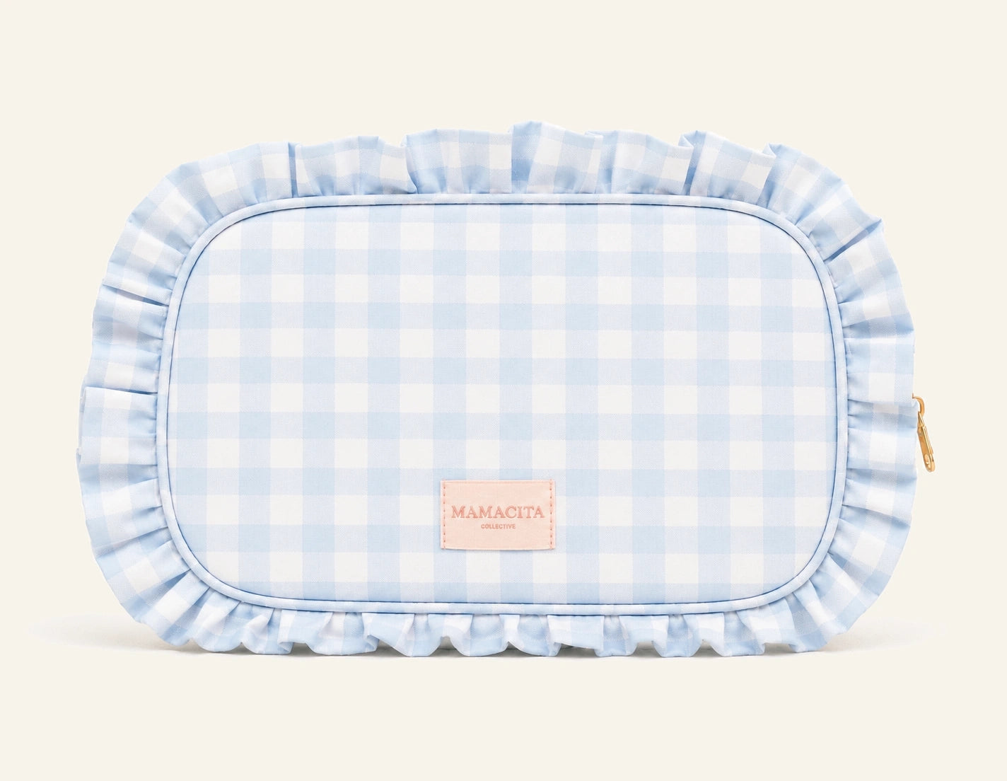 A light blue and white gingham zippered pouch with a ruffled fabric border, featuring a small peach-colored 'MAMACITA' brand patch on the front.