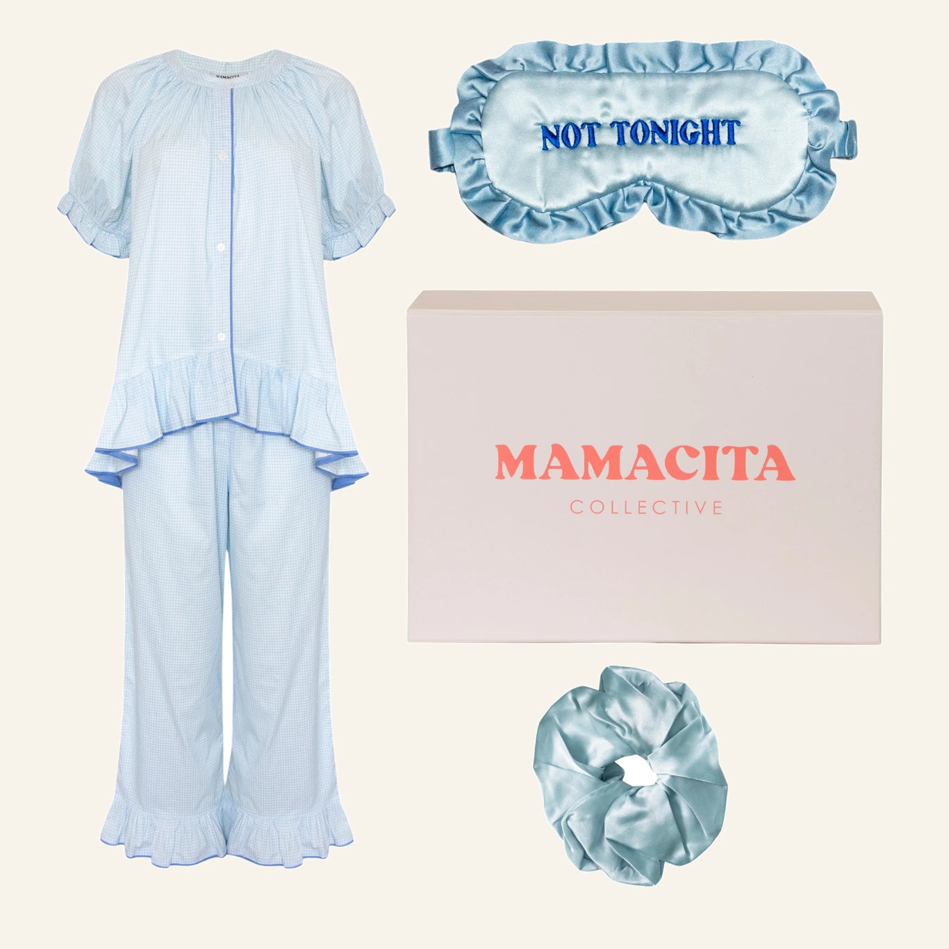 The Slow Morning Edit gift box featuring the Bonnie Ruffle Sleep Set, silk eye mask and silk scrunchie.