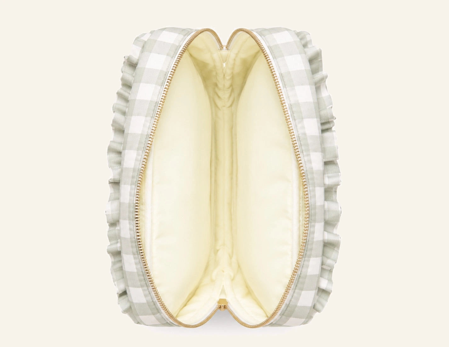 An open double-compartment makeup bag with a light green and white gingham pattern, gold-tone zipper, and a pale yellow satin lining, shown against a plain white background.