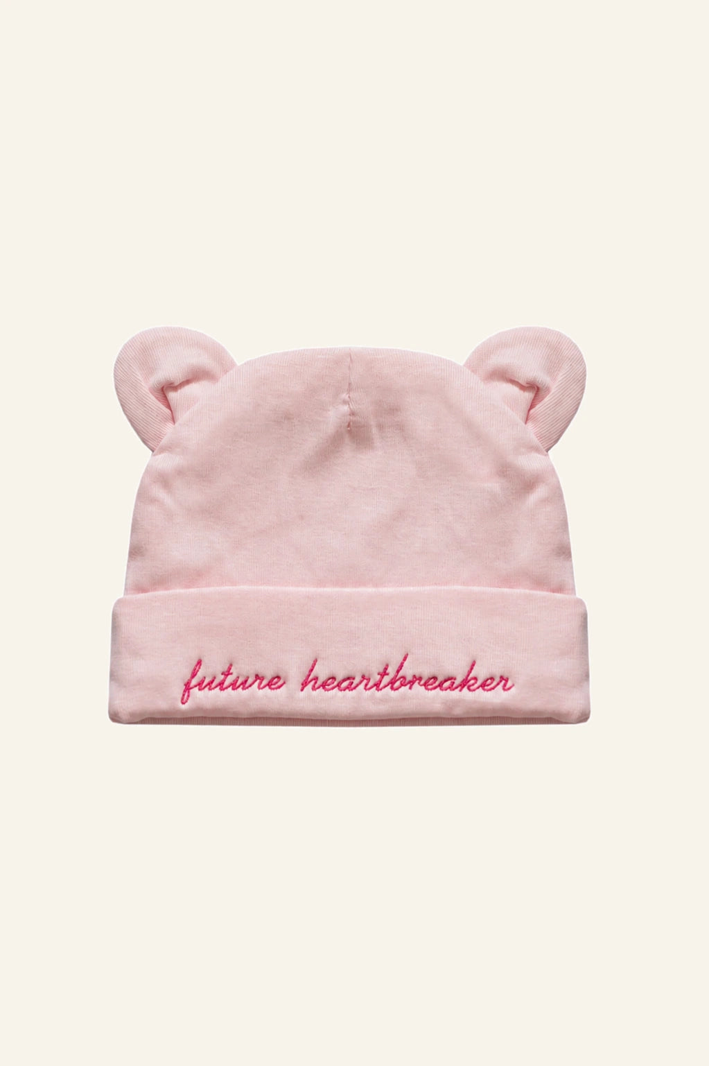 Mamacita Collective Soft Newborn Hat in Pink worn by a baby.